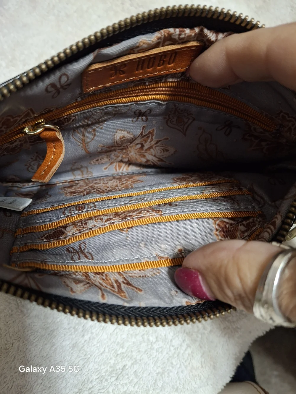 HOBO INT Black Leather Wristlet Clutch - Versatile Women’s Bag